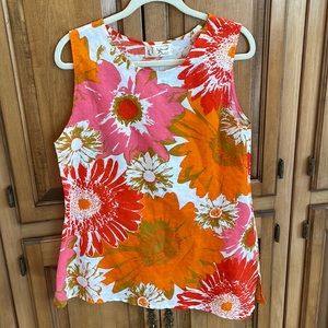 Size L, asymmetrical sleeveless blouse.  Pretty shades of pink and orange.
